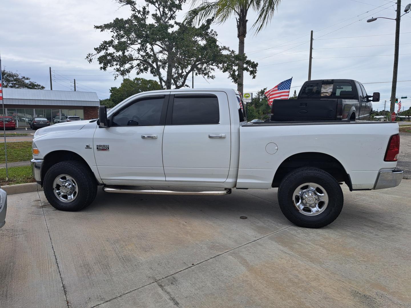 2011 White /BEIGE Dodge Ram 2500 Power Wagon Crew Cab 4WD (3D7UT2CL4BG) with an 6.7L L6 OHV 24V TURBO DIESEL engine, AUTOMATIC transmission, located at 1181 Aurora Rd, Melbourne, FL, 32935, (321) 241-1100, 28.132914, -80.639175 - Photo#0